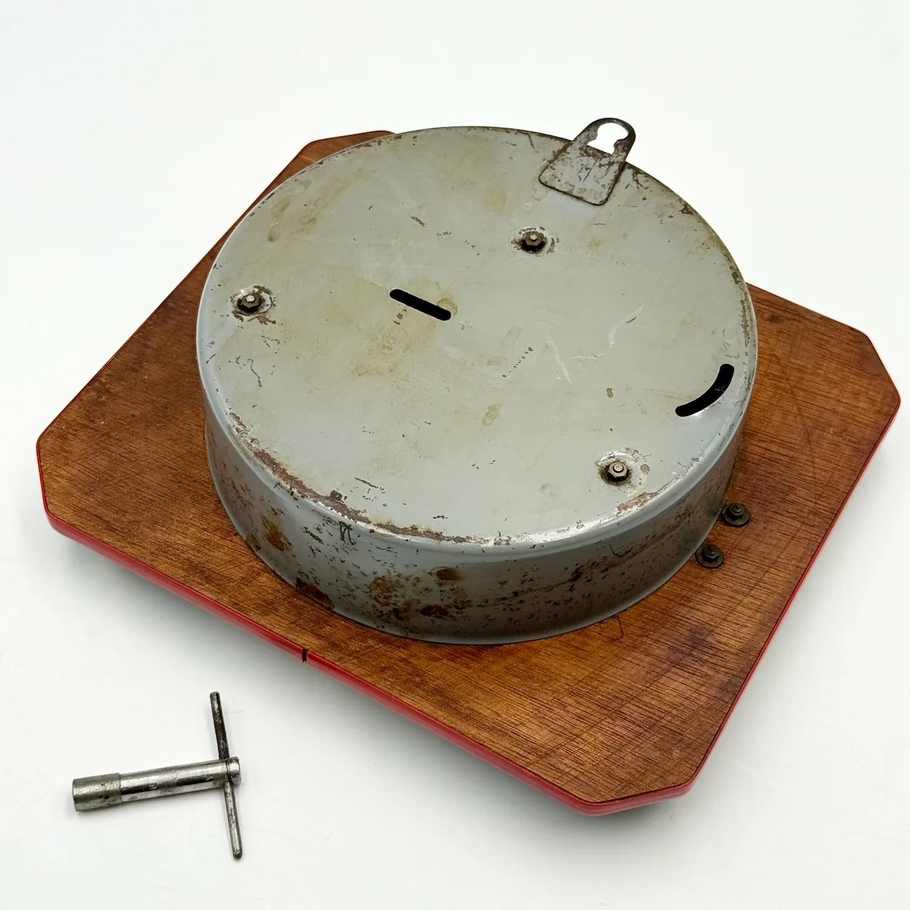 Authentic vintage French wall clock by FFR 1950s, black and ivory Formica with coral edge, brass hands, glass window and original key, Made in France