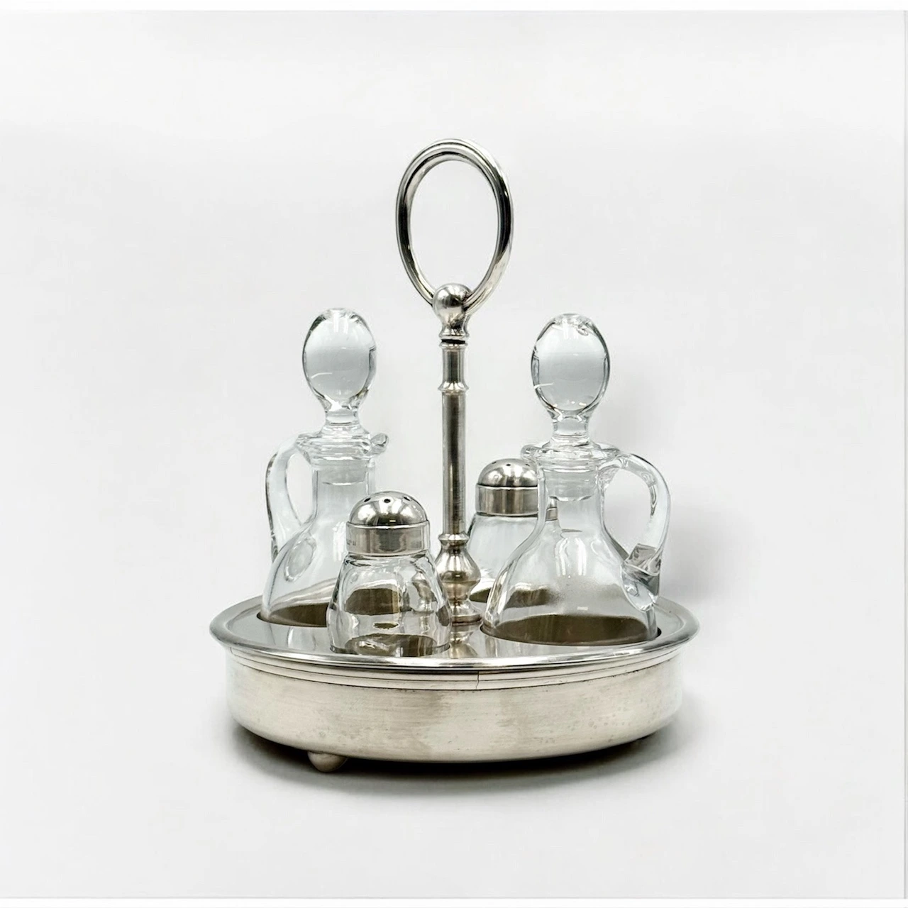 French-Mid-Century-condiment-set-by-Christofle-and-Fleuron-with-silver-plated-stand-ring-handle-signed-glass-bottles-and-shakers