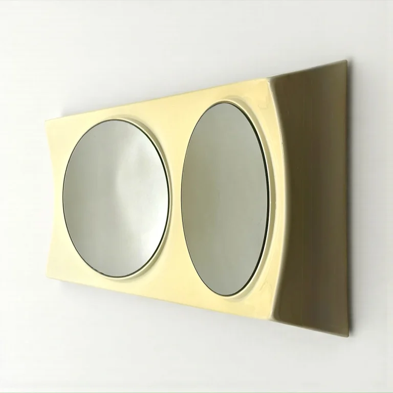 Rare UFO wall mirror in flexible ivory plastic Italian Space Age design 1970s