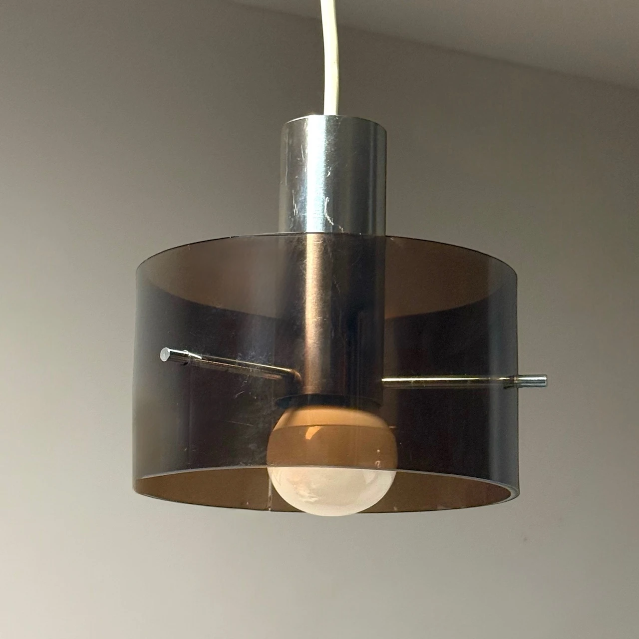 Smoked plexiglass pendant light with beautiful vintage glow Italian 1970s Space Age design