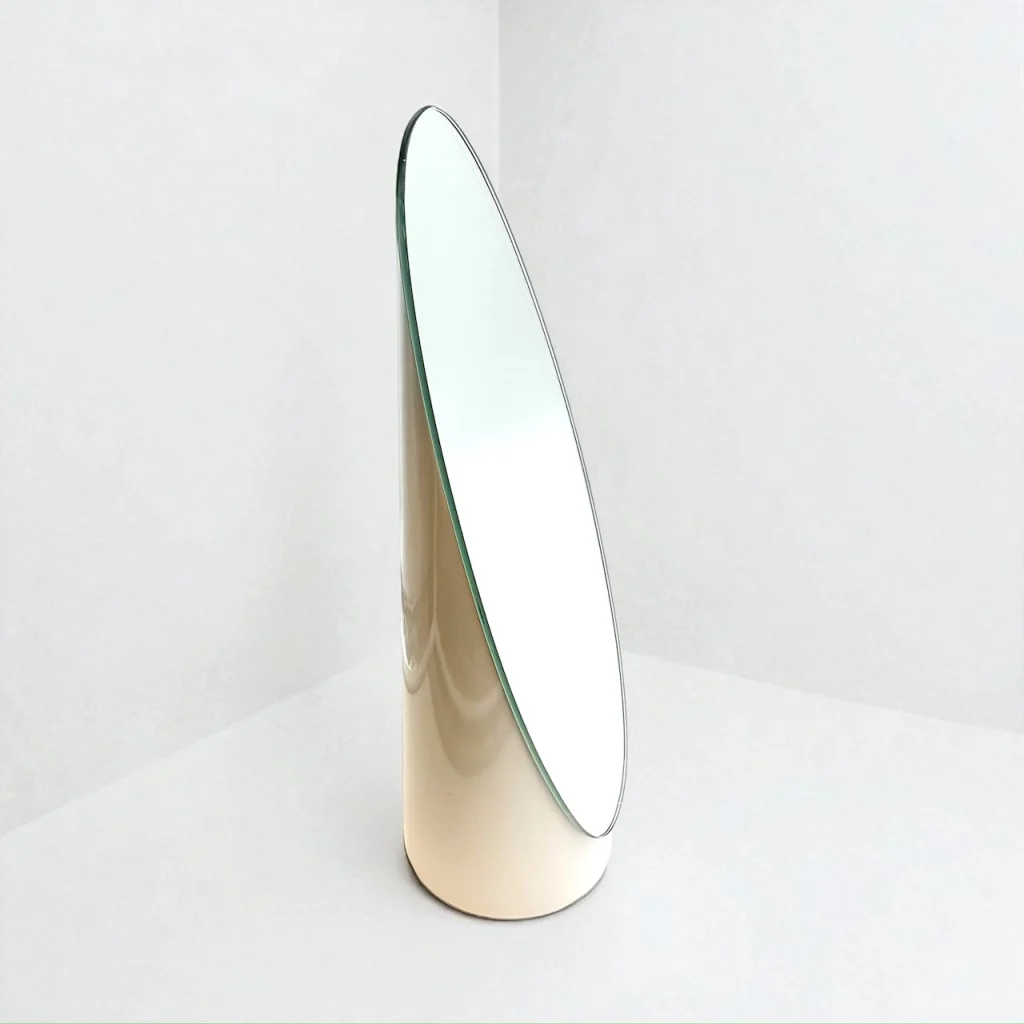 Striking white lipstick mirror from 1970s in Italian Pop design with oval tilted glass and glossy base