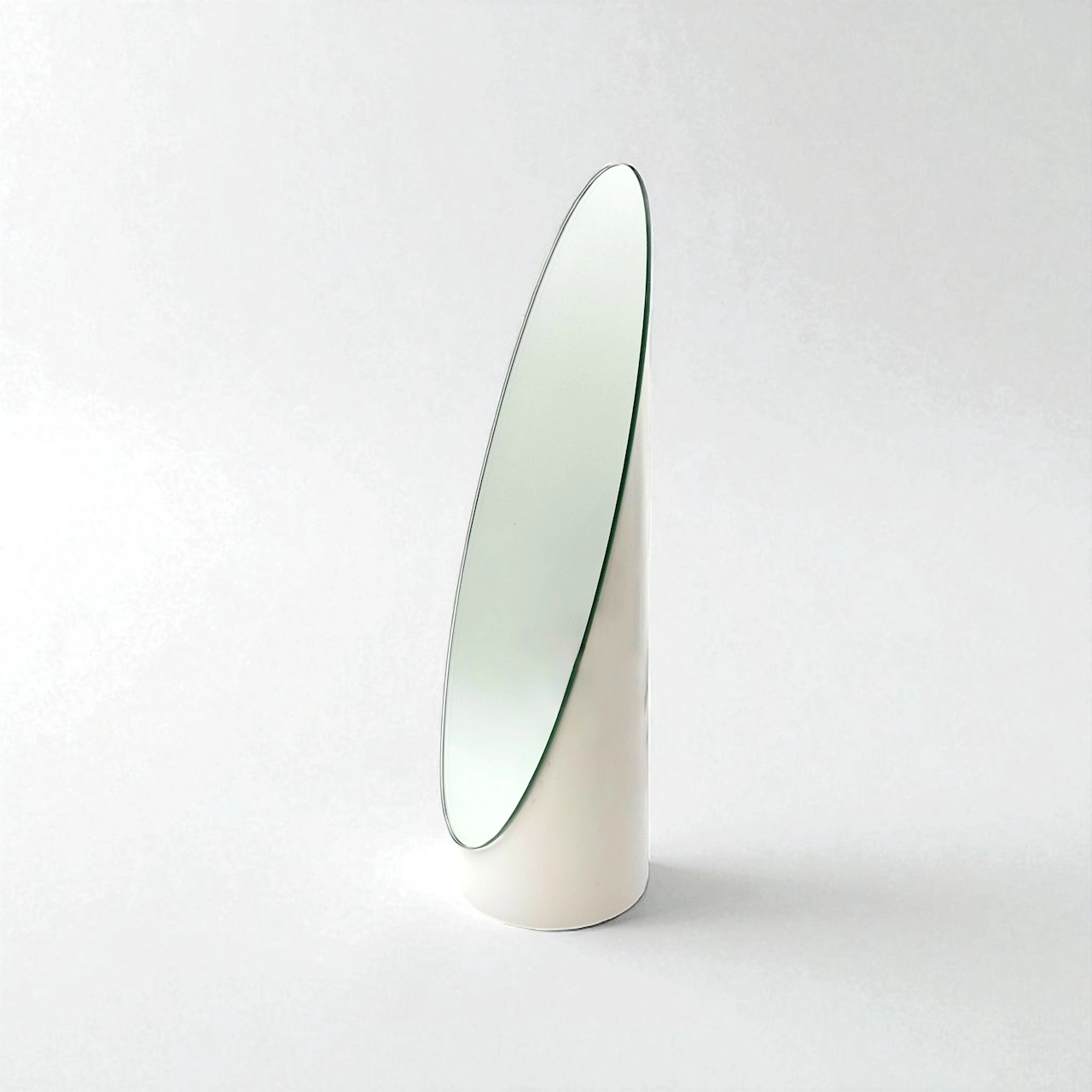 Striking white lipstick mirror from 1970s in Italian Pop design with oval tilted glass and glossy base