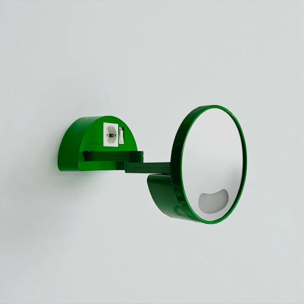 Makio Hasuike green wall mirror for Gedy with extendable arm and integrated light 1970s Italian design