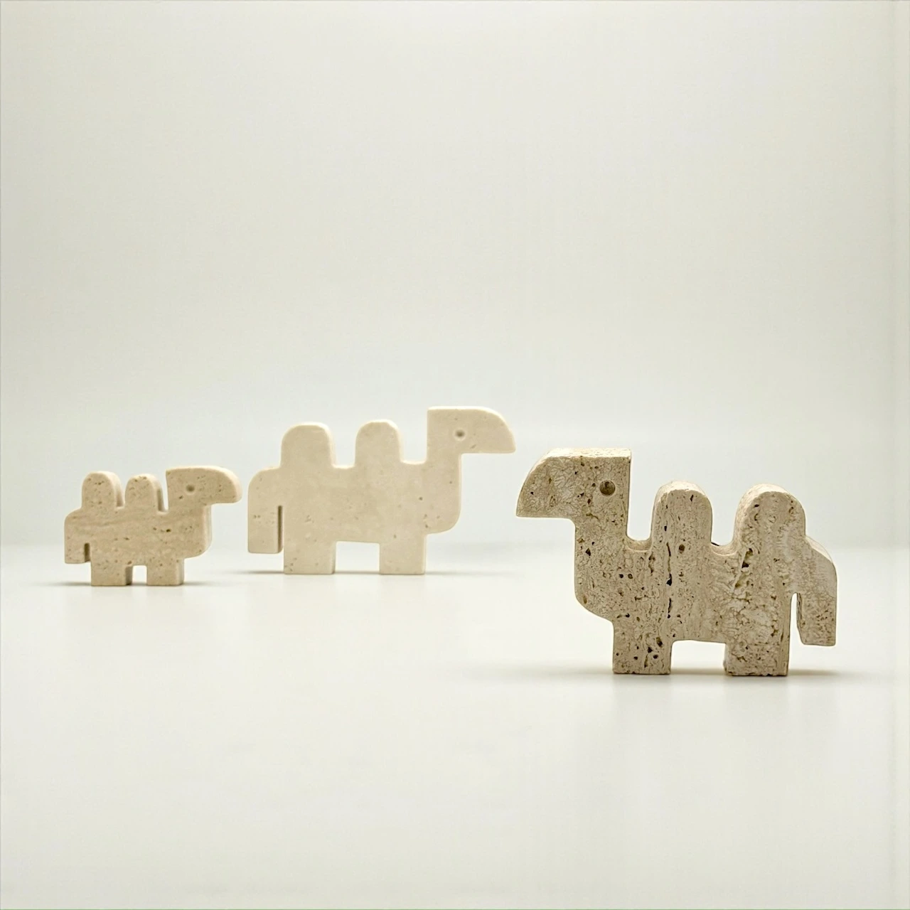 Travertine animal sculptures Italian camel figures vintage set