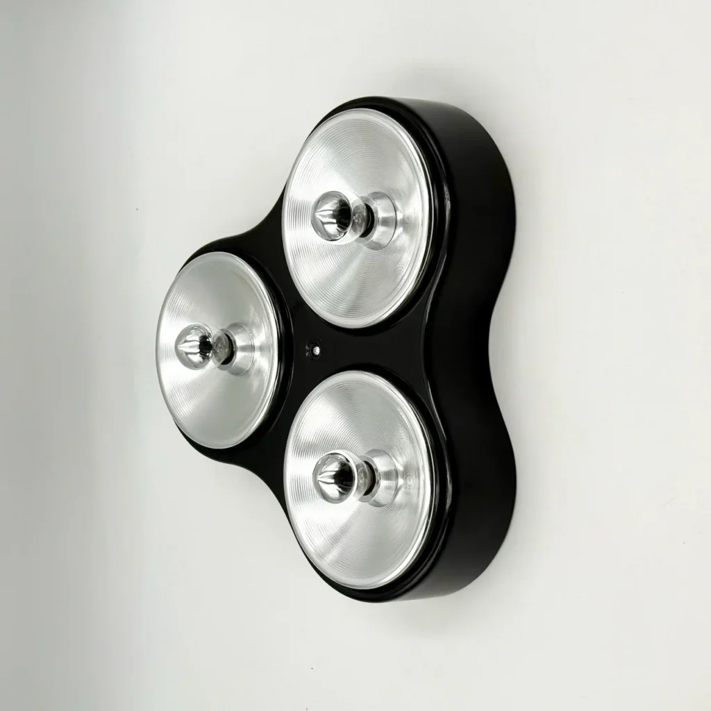 Harveiluce model 5032 space age ceiling lamp in black ABS and chrome Italy 1970s