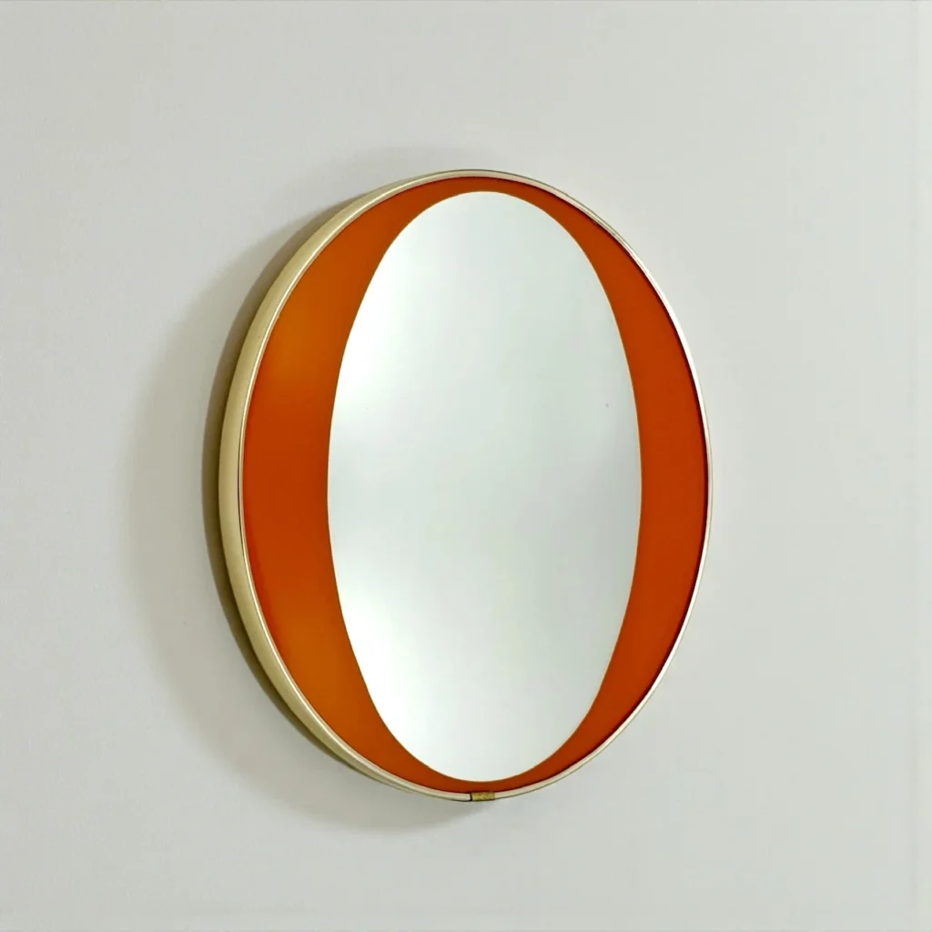 1970s orange mid century mirror with brass frame