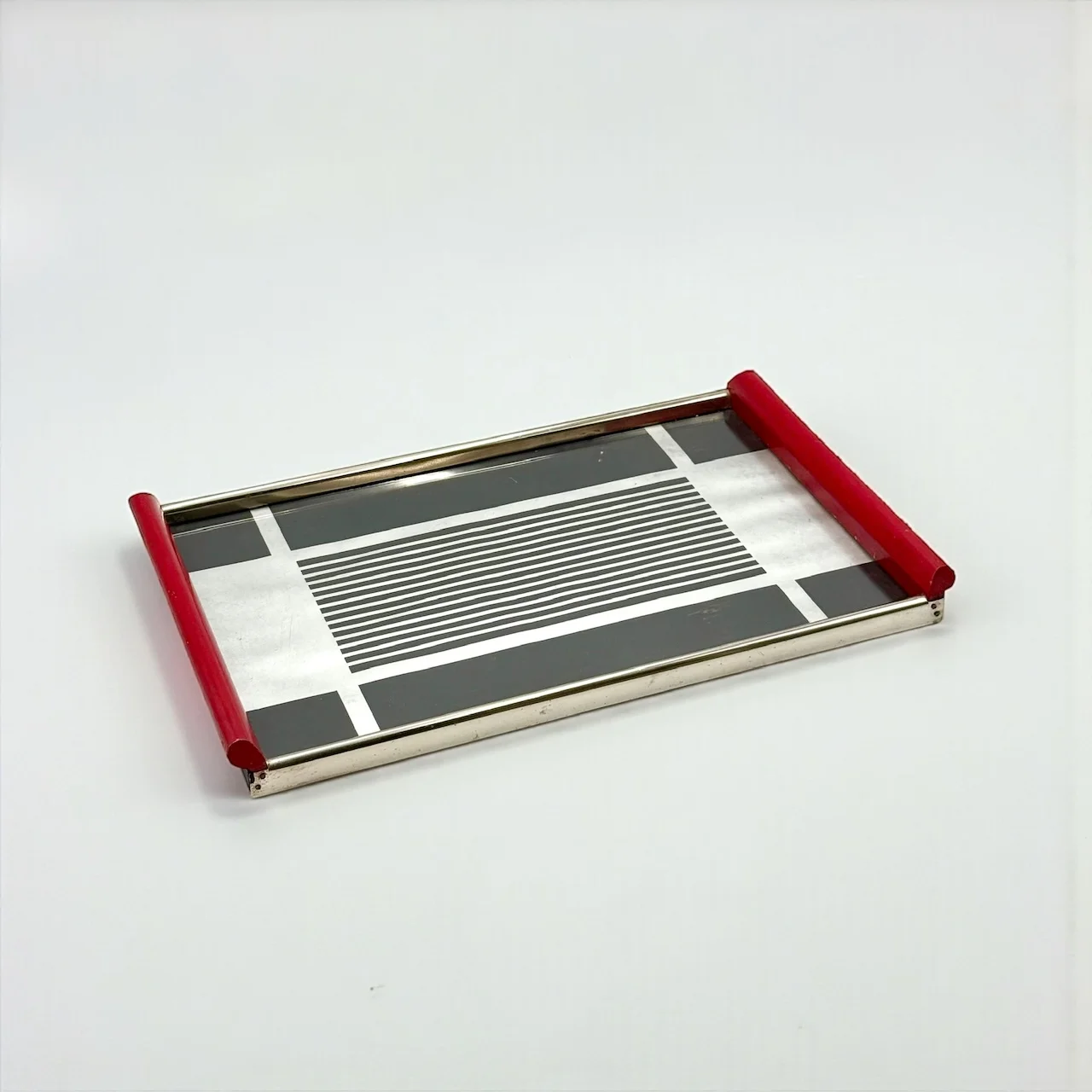 Space age tray with glass top and modernist graphic design Europe 1970s